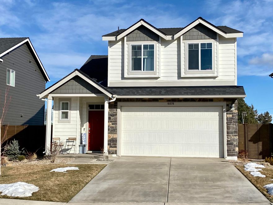 The popular Sherwood plan at Stone Creek in SE Bend is a 1,659 square foot beauty. This two-story home has 4 bedrooms; 2.5 baths and a two car garage. Open concept layout with gas fireplace in great room. Solid surface countertops, gas range, microwave, dishwasher, refrigerator, washer and dryer are all included! Laminate flooring throughout main. There is a smart home panel that you can use for the front door lock, lights, thermostat, and garage controls. Both the front and back yard spaces are fully landscaped. The front yard is maintained by the quarterly HOA of $212.00. The home also features central AC, a high efficiency furnace, hybrid heat pump water heater, and window blinds. The HOA dues also give residents access to the Community Pool. Stone Creek Park and Silver Rail Elementary school are both within walking distance from the home. Shopping, dining, entertainment and medical facilities are close by. This lightly lived in home is a showstopper!