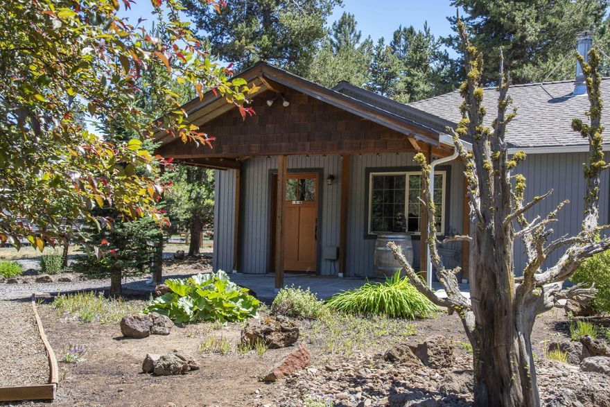 This well kept single level home is a dream with space for everyone. A shop for him, an open kitchen for her, with a large flex space for the whole family. This primary suit is heaven away from the world when you need to get away. It features a beautiful walk-in shower, dual sinks, and an oversized walk-in closet that can accommodate more clothes than a typical store.  If having a family night is a must, the bonus room does not disappoint. Pool table, darts, video games, there is room for it all. There is also plenty of room for any toys you may have. The second bedroom is large enough (12x24) to be divided to create a third bedroom.  There's even a new ATT septic system that's only a year old!  Put this home on your tour. You won't want to miss it. Call/Text and schedule your appointment to see this piece of heaven now.