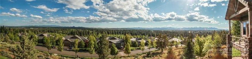 Expansive mountain views. Southern and western breathtaking views from almost every room. Main level living w/ gourmet granite kitchen, dedicated office, artist loft, 2 master suites, terrific bonus,room for a large cellar. Triple garage with epoxy coating. High level craftsmanship throughout. Beautiful cabinetry, Travertine, stone detailing. Tray ceilings, accent lighting for tasks & artwork. Trex decking. Every upgrade imaginable. Beautifully landscaped. Thoughtfully designed for privacy. Flat driveway.