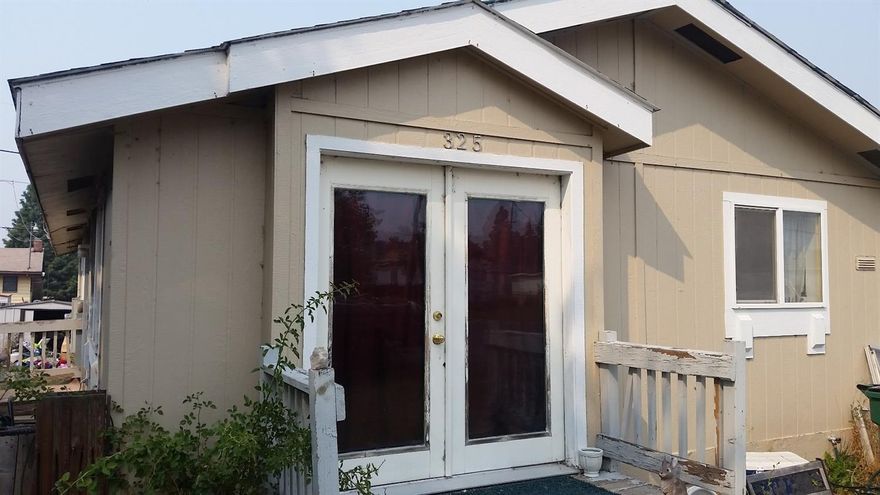 This is a cute three bedroom two bath manufactured home on a foundation. The backyard is fenced and the front yard features a mature Plum tree. This home is close to Harbor Isles golf course and is walking distance to Pelican Elementary School. Sellers are currently working on replacing flooring and other minor repairs. This would make a great home or investment property. Owners rented it out previously for $900 per month.