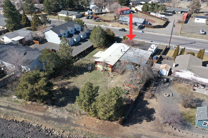 Attention investors and developers! Don't miss this incredible opportunity in the heart of SW Redmond. This R4 zoned .52 acre level lot offers potential for multifamily development. Amazing location backing to the canal, this lot is close to downtown, shops, restaurants and offers easy access to Highway 97. There is currently a 3 bed, 2 bath manufactured home on the property. Call for more details.