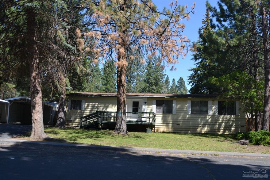 Beautifully maintained mobile home only (no land). Located across from a park on a peaceful street in Romaine Village. High ceilings, newer renovated pool, water and garbage pick up. This is your opportunity to buy an affordable home in Bend. Priced to sell, don't wait to see, this one won't last long.