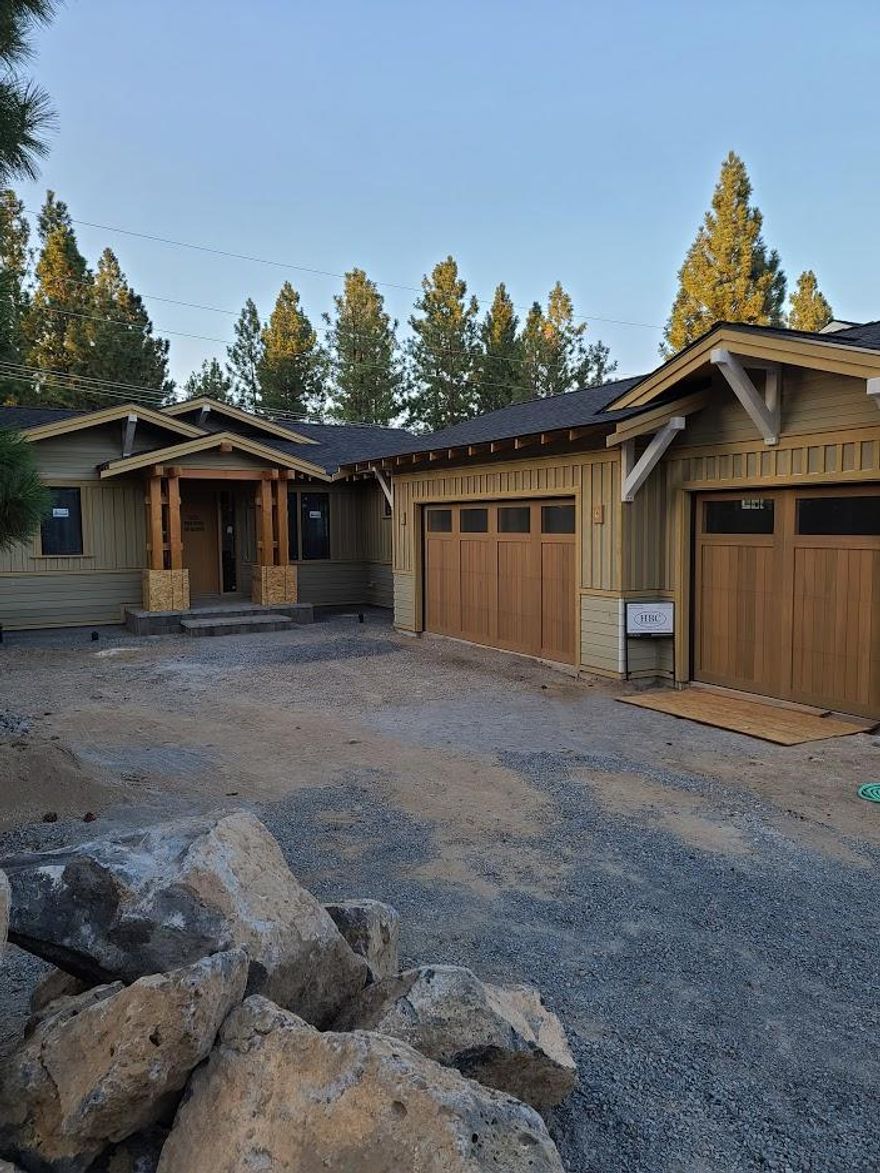 Great room concept with designer finishes. 
Master on the main. Hardwood floors in main living area. Tile floors in laundry and bathrooms. Quartz counter tops.  High end appliances and a beautiful gas stone fireplace in living room.
Large upper deck plumbed with natural gas, large backyard with paver patio and natural gas fire pit. Earth Advantage Home.