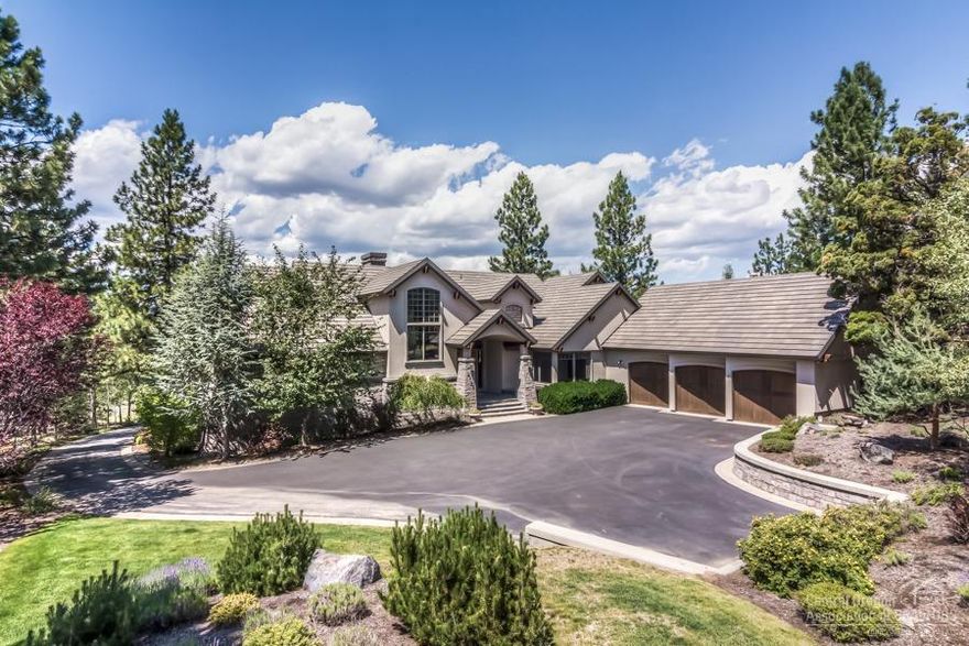 The highest quality material and million dollar views captured in every living space, come together to create one of Awbrey Butte's most desirable masterpieces. Nestled amongst mature landscaping & old growth timber, you will enjoy seclusion, expansive outdoor living spaces & larger than life panoramic views. Expansive and open floor plan features oversized picture windows that capture natural light, & all main level living. Centered on a chef's kitchen, main level also includes formal dining, executive office, & deluxe master suite. Home highlights exotic tile, slab granite, custom cabinetry, real wood accents, and custom finishes throughout. Upstairs features 2 separate en-suites with downstairs having second great room, wine area and 4th bedroom. Impeccably maintained for the discerning buyer with quick access to shopping and dining. Full appraisal completed 12/19/18, report valued home at $1,750,000.