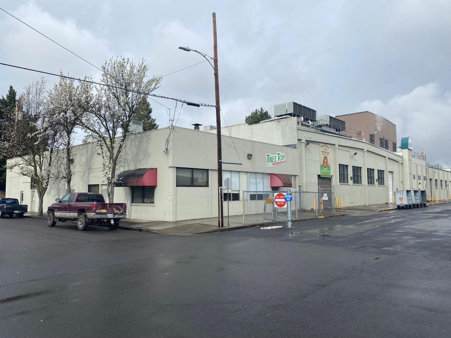 Former food processing facility with high ceilings and heavy power.  Building has updated lighting, concrete floors, and floor drains.  A combination of concrete & CMU block construction.