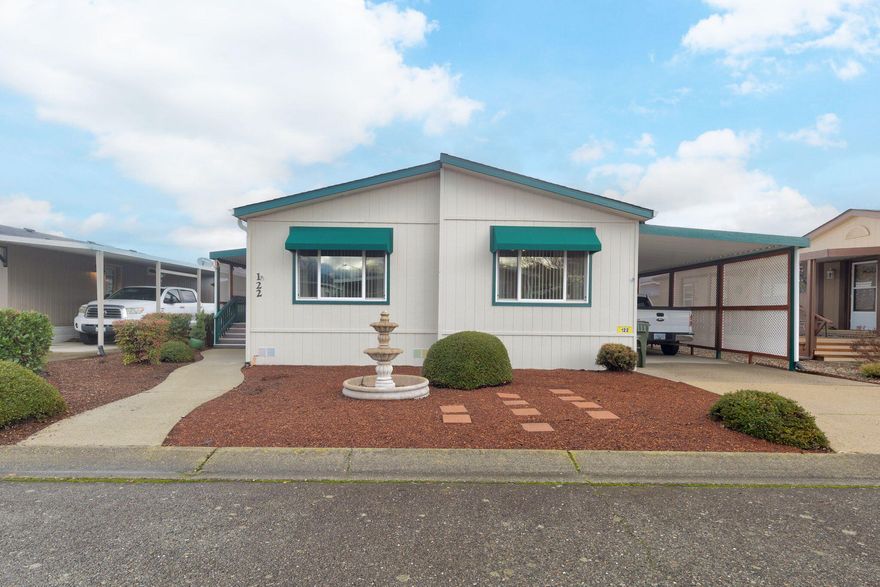 Manufactured home located in Willow Estates Mobile Home Park. This well-maintained 2-bedroom, 2-bath home offers 1,367 square feet of comfortable living space, built in 1996. The home you have been waiting forâ€''gently lived in and thoughtfully updated.

The spacious great room provides an inviting gathering space, complemented by a light and bright living room and a dedicated dining area. The updated kitchen features a new range and ample cabinetry. The primary bedroom includes an ensuite bath with an oversized shower.

Outdoor features include a large covered deck, landscaped yard, tandem carport, and storage shed, completing a functional and attractive home site. Recent improvements include a new roof, exterior paint, and skylight in 2024, along with a new heat pump installed in 2018.