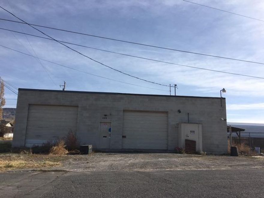 Great location in light industrial zoning. In addition to the super building used as all purpose shop/warehouse is the fenced triangular lot, great for vehicle, utility and multi use storage. A great buy for a great property.