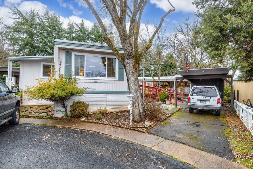 Wonderful 2 bedroom 1 bath mobile home in Jacksonville's 55+ Royal Mobile Estates is ready for it's new owner.   This lovely well-maintained home has a new HVAC and a great space at the end of a cul-de-sac featuring 3 sheds, one with power, deck, patio, ramp, room for a garden and a covered parking spot. Space rent covers garbage, water and sewer.  Cash only and buyer must be approved by park to purchase.