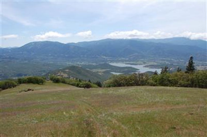 This outdoor paradise is tucked away in the mountains of Southern Oregon; presenting views of the entire Rouge Valley and Siskiyou Mountain range. The Ranch consists of 4395 +/- contiguously deeded acres, and is located just 8 miles south east of Ashland. Wildlife on this ranch is flourishing. The rolling hills allow for record class deer, Elk, bear, upland game,and Golden Eagles possible to be seen at any given viewing. Mt Ashland and Emigrant Lake can be seen from any one of the ridge tops this trophy wonderland has to offer. This is truly a magnificently private and convenient ranch.