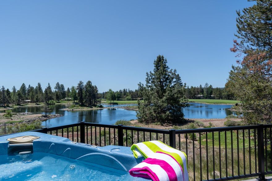 Rare setting in Sunriver! On the market for the FIRST time in 25 years!  Spectacular views of the pond and the 9th hole of the Woodlands Golf Course! Wonderful park-like setting Sun Forest Construction home which boasts vaulted wood ceilings for an open great room feel. A wood-burning fireplace w/ convenient gas start warms those cool evenings & central A/C keeps the house cool in the summer. A spacious kitchen provides tons of storage for all the necessities, great prep space, breakfast bar & adjacent powder bath. Enjoy the new Timbertech wrap around composite deck & railing while you relax in the hot tub or BBQ while soaking in the magnificent sunsets, wildlife & beautiful star-filled nights. The primary bdrm suite is upstairs & has its own balcony. The primary suite bath offers a large soaking tub, dual sink vanity & shower. Two spacious lower bdrms, one with covered deck area, & full bath in hall, are perfect for guests. 2-Car garage & large storage area. SHARC paid. Furnished.