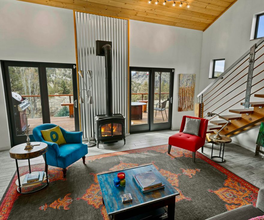 A very special Custom Home on 5.15 Acres with rolling hills and Views of the Cascade Mountains. Relax in this Open Floor Plan with an additional 192 Sq. Ft. 2nd Bedroom, Guest Cabin/Studio below and a  bathhouse & set up to accommodate a Sauna or Jacuzzi, providing additional space and possibilities with total privacy. Plus an RV area and covered separate deck for watching sunsets along with the decks at the house. The Solar Panels & Tesla battery system create over 80% efficient and emergency power. The trails around you provide Hiking, Biking, Horseback Riding and excellent Fly Fishing at Folley Waters or Steelhead Falls right down the hill. And the Golf Course, Tennis & Pickle Ball Courts and Swimming Pool amenities make you feel like you're on vacation all the time. A special home and property in Central Oregon.