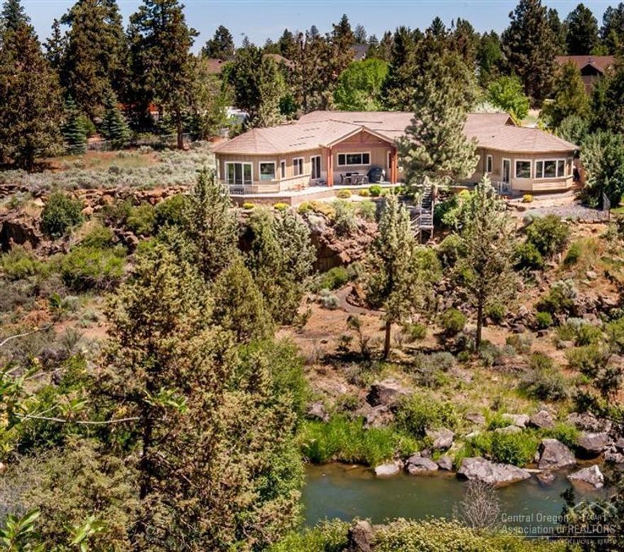 Breathtaking setting on the Deschutes River in the heart of Bend Rare 1/2 acre of private riverfront property Dramatic 1/4 mile views up and downstream from the 1000 sq ft paver patio This single level uniquely designed home captures stunning river views from most rooms Optimal solar orientation with great south & west exposure 3bed/3ba + great room, family room, office, bonus rm Oversized 3 car garage + fenced RV parking Short walk to river trail Located on quiet cul-de-sac minutes to downtown & shopping