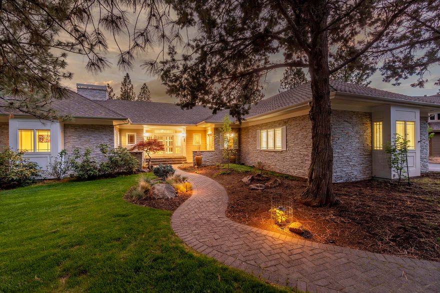 A little slice of heaven in Awbrey Glen with views of the Cascades and 2nd Fairway. Spacious Living room has linear gas fireplace and French doors leading out to expansive deck. Gourmet kitchen with two center islands, quartz counters, cabinets galore, walk- in pantry, newer appliances, breakfast bar and wonderful natural light with views at all angles. Formal Dining Room easily holds a banquet sized table. Master Suite is on main level complete with 2 walk-in closets, dual vanities, soaking tub & separate tiled shower. Guest suites are downstairs plus family room with new linear fireplace, wet bar w/ frig allowing complete privacy from main level. Don't miss the wine cellar, two offices and massive storage room. Plus there is a Flat Driveway! And much more.