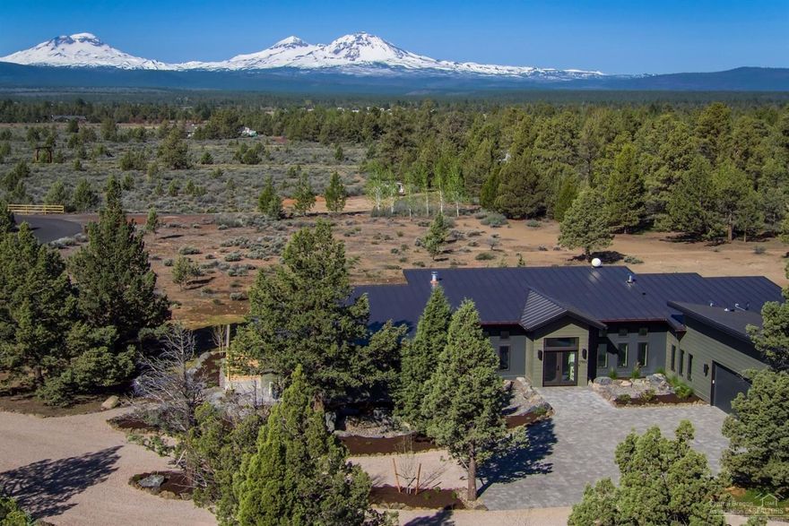 This modern custom masterpiece on 4.72 acres is everything you've been looking for! Cascade Mountain Views are displayed throughout all the rooms of the house! 3 bedrooms 3 full bathrooms and a large great room highlight this functional floor plan that lives much larger than the square footage. Gorgeous Designer Kitchen w/Open Concept Floor Plan. Stunning Master Suite w/Japanese soaking tub, office/nursery and access to the back deck. The home takes advantage of its private setting while offering an abundance of Natural Light and Stunning outdoor space. Attached Oversized 2 Car Garage.