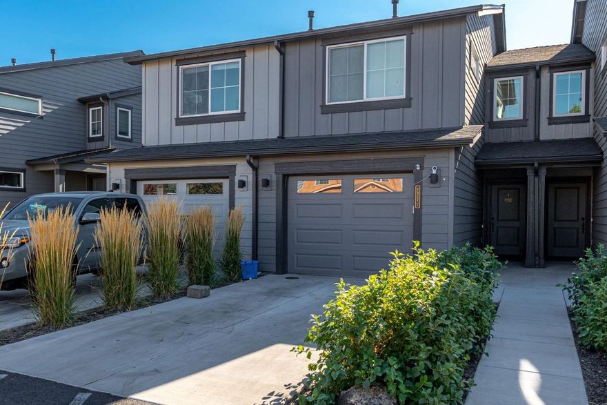 Rare opportunity to own 16 units in a desirable location near St. Charles Hospital, schools, shopping, and Bend's favorite restaurants. Each building features 12 bedrooms, 8 bathrooms, a one-car garage, and off-street parking in a residential neighborhood within walking or biking distance of medical and commercial districts.
The downstairs boasts an open floor plan with a kitchen, countertop seating, dining area, living room, and garage access. Upstairs includes a primary suite, two bedrooms with a shared bath, and laundry. Each unit has a patio for outdoor seating and an enclosed storage closet. Built in 2020, these low-maintenance properties attract excellent tenants and maintain low vacancy rates.