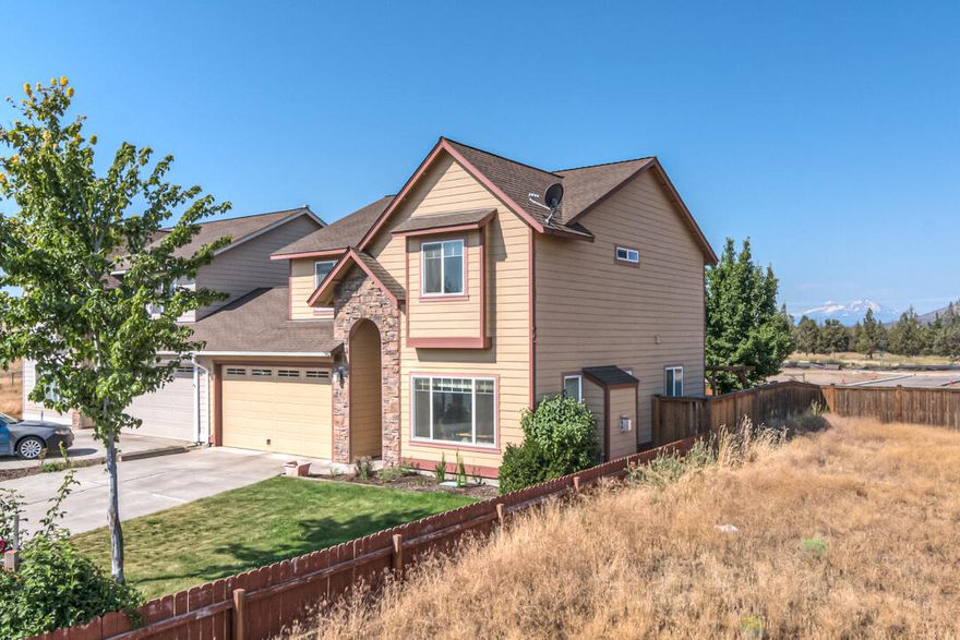 Location, Location! Tucked away in this SW location offers easier & faster access to Bend. There are no HOA dues! The only common wall between the townhome is attached by the garage & 2 townhomes in the building. Nestled in a cul-de-sac with 2nd story Cascade Mtn. and Cline Butte views next to an upscale residential neighborhood. Exterior entryway with arched ledgestone accents, decorative front door, Hardie Plank siding and central AC. Good working kitchen, tile floors, granite tile countertops, decorative tile backsplash, maple wood cabinets, crown molding, breakfast bar, stainless steel appliances. Inviting eating area, sliders out to the back patio. Generous sized master suite, dual vanity, tile floors, walk in closet, tub/shower combo & linen closet. Loft area for flex space, good master BR separation from the other 2 bedrooms. Living room features a gas FP, wood mantle, slate hearth & surround. 2 car attached garage, fully fenced back yard, nicely landscaped and concrete patio.