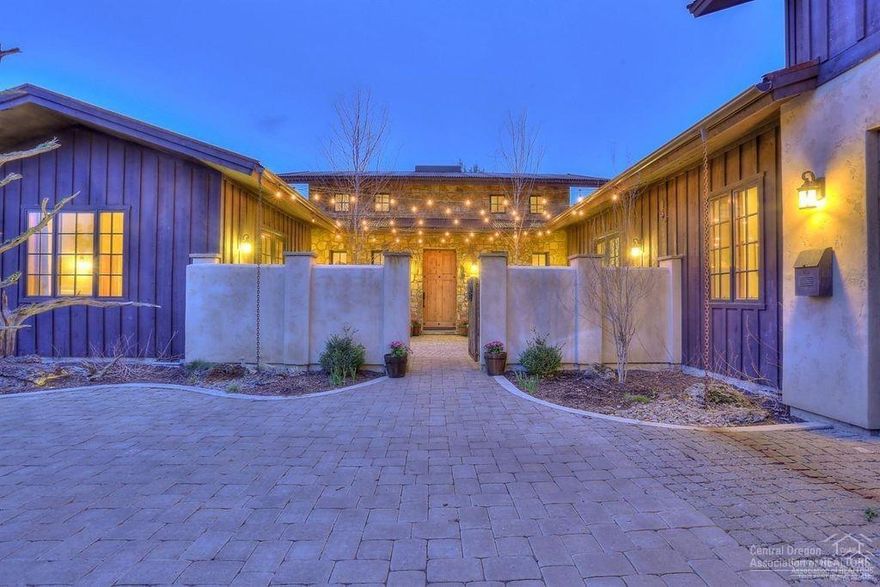 This stunning French Country home sits on the 2nd tee box of the Nicklaus Course in the exclusive Pronghorn Resort Community. The private courtyard welcomes you with its timeless European stonework before entering the large open-concept living area. It's 10 to 20-foot ceilings offer a naturally illuminated living area and kitchen. Home features 2 master suites and an office on the main level, with 2 additional bedrooms and a bonus living area upstairs. The hand plastered European style walls, custom aged wood floors, exposed reclaimed oak beams, and oversized French doors offer an Old Warm charm and elegance that's unmatched. The lush backyard features a seating area, fireplace, outdoor dining, and spa for an extended outdoor living experience right on the golf course. Pronghorn Resort offers the best restaurants, fitness centers, clubhouse, pools, pickleball and tennis, 2 golf courses, and access to several biking and hiking trails nearby. This is the total package.