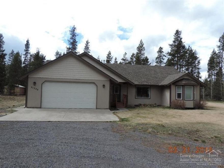 Want the convenience of in town living, but still have an acre of land? This is it! Custom built by Randy Yow in 2003 on quiet, paved, dead-end street. Just blocks from city center, convenient access to Hwy 97. Upgrades galore! From custom pine shaker cabinets, wood trim/doors, stacked rock alcove for propane stove, and granite & tile counters, stainless appliances, jetted soaking tub, recessed lightingand more! Open floor plan with room to build a shop, city water/sewer & well for watering the lawn!