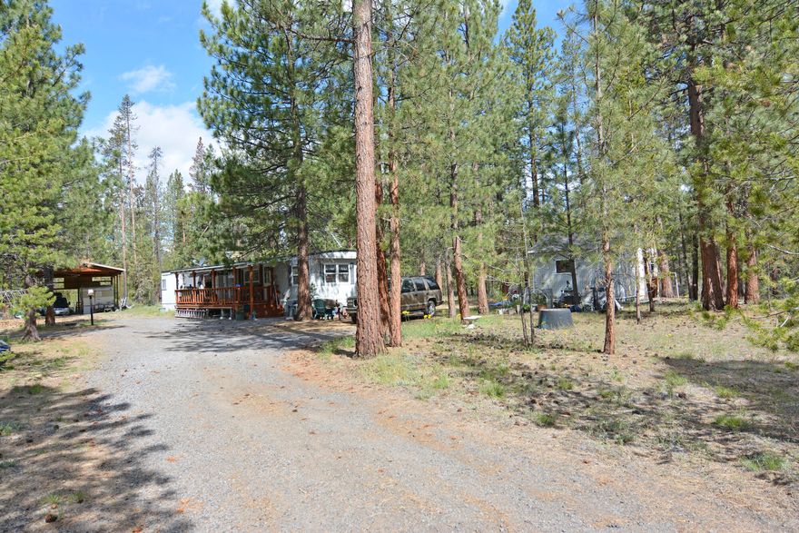 A Personal  Residence,  Vacation  Home, Rental Property or
Retirement  Location...........you  choose.
The home  is a well cared for 854 sq. ft. + 12x20  addition,  3
bedroom, 1 bath older manufactured  home on 2.27 well- treed
acres. Updates  include a hot water recirculating  pump and luxury
vinyl plank  flooring.  A very peaceful setting  yet close  to town .
Outbuildings  include a 20x26  carport style RV storage,  a7x7
greenhouse,  a 10x20 ''mini barn'' studio  with l20v power,  a l4xl4
pump  house with full concrete basement/root  cellar for storage  and
a 400 sq. ft. (approx.) heated/ac  wood shop with 240/120  volt sub
panel.
Near to the Cascade  Mountains, Lakes,  Rivers and all the
recreational  opportunities Central Oregon has to offer.