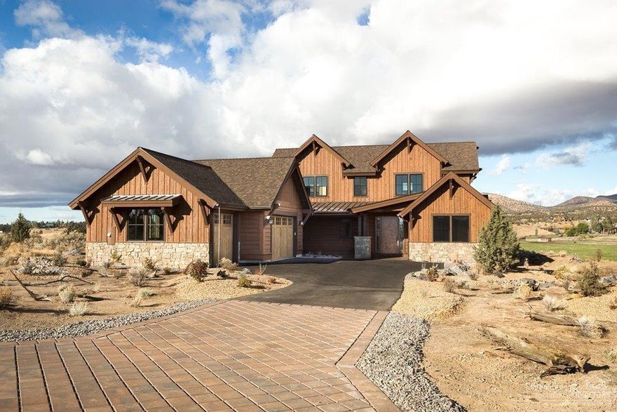 Come See this Gorgeous Home with Exterior Stone Accents, Vaulted Ceilings with Beautiful Beam Truss Work, Stone Fireplace, Gourmet Kitchen with Chiseled Edge Countertops, Large Master Bath with Freestanding Tub, Tiled Shower, Two Bedrooms upstairs with Jack and Jill Bath, Loft/Bonus Room, Large Utility Room, Great Outdoor Living Area overlooking the Horse Pasture, Brasada Ranch and Powell Buttes, Walking Distance to the Lake with Floating Docks and Nice Walking Path.