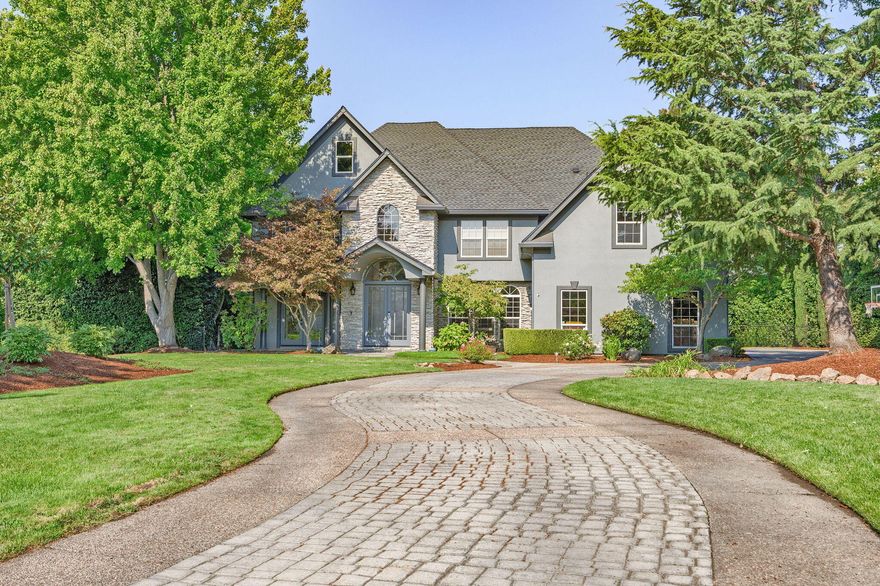 Experience luxury in this beautifully remodeled E Medford home, nestled at the end of a quiet cul-de-sac near RVCC. With 4 bedrooms and 4 full baths, including a additional separate full pool bath, this home features formal and informal dining areas, a cozy living room with a gas fireplace, and a flex space that could be an office or play/tv space. The master suite is a retreat with a spa-like ensuite, including a large shower, freestanding tub, heated floors, dual sinks, and a spacious dressing area. The gourmet kitchen has live edge granite countertops, top end appliances, a massive pantry, and a separate beverage room with an ice maker and wine fridge. The great room, with its soaring ceilings and natural light, opens to a private backyard with a patio, pool, spa, and pool house-studio. Situated on a .57-acre lot with a park-like setting and ample privacy, this home is a special find.