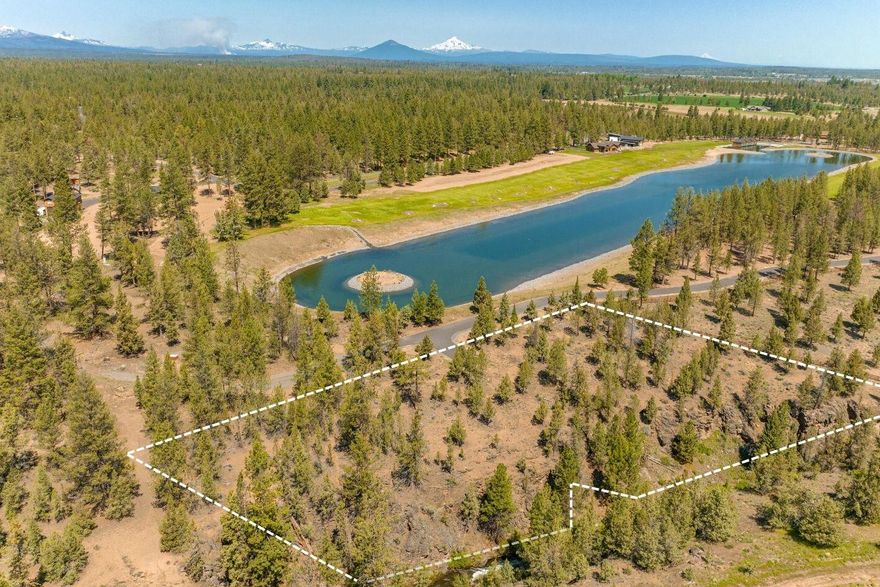 Tanager is a haven for outdoor enthusiasts seeking a harmonious blend of waterfront living and endless recreational opportunities. Located just past the edge of town on Bend's Westside, this 182-acre community provides the convenience, lifestyle, and tranquility one desires. Lot 12 stands out as one of the few options in Tanager for creekside living, boasting the unique advantage of bordering HOA property to the North and West. This particular lot offers a serene and picturesque setting, perched above the scenic Tumalo Creek canyon. Start your mornings with the soothing sounds of birdsong and the gentle rush of the nearby rapids. With a private trail leading directly to the creek, indulging in a fly fishing adventure is effortless. Additionally, the south end of a private waterski lake is steps away, providing even more recreational opportunities right at your fingertips. Tanager is more than a neighborhood, it's a way of life, and we invite you to come experience it for yourself.
