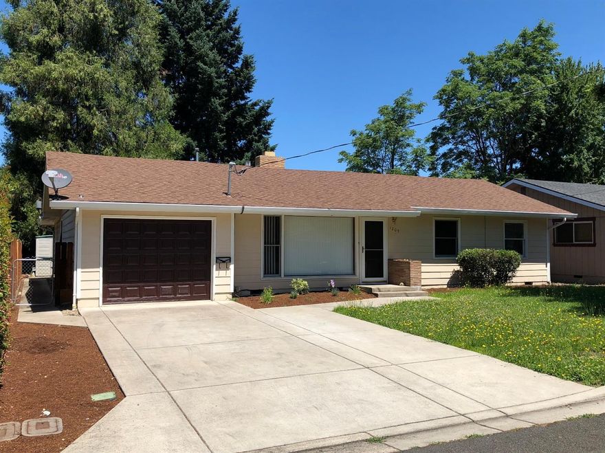 Affordable excellence! Well-kept 1987 sqft, 4 bedroom, 2 bath home, with hardwood floors that were just refinished, new ceiling fans, cabinets, fireplace, large living room, large den, master bedroom w/master bath and lots of closet space. Built-in cabinets and blinds throughout. This home includes refrigerator, range/oven, dishwasher and washer & dryer. Great backyard with old growth trees, lawn, shrubs and sprinkler system, all freshly landscaped and fenced with storage shed. Great central location, wonderful home in a nice neighborhood. Vacant and easy to show!