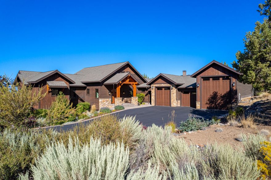 Perched at the top of Eagle Crest Resort, this stunning masterpiece offers panoramic Cascade Mountain Views from nearly every room!

Masterfully constructed, this true timber frame home features Northwest-Sourced large Douglas Fir beams, with exquisite mortise & tenon joinery, Montana Timber Douglas Fir siding, and extensive Montana Stone accents.

Soaring Ponderosa Pine ceilings, solid Douglas Fir beams, expansive windows, Montana Stone fireplace, Brazilian Teak hardwood floors, Knotty Alder cabinetry, and solid four-panel, eight-foot doors throughout.

The well-appointed kitchen will inspire you with top-of-the-line appliances, walk-in pantry, and multiple dining areas.

Luxurious primary suite, dedicated office or fourth bedroom, and cozy loft offer spaces to retreat, work, or meditate.

Two additional bedrooms with ensuite full baths and a bonus room with a pool table and wet bar await your guests.

The 1769 sq ft heated garage includes a workshop and 45 ft RV Bay.