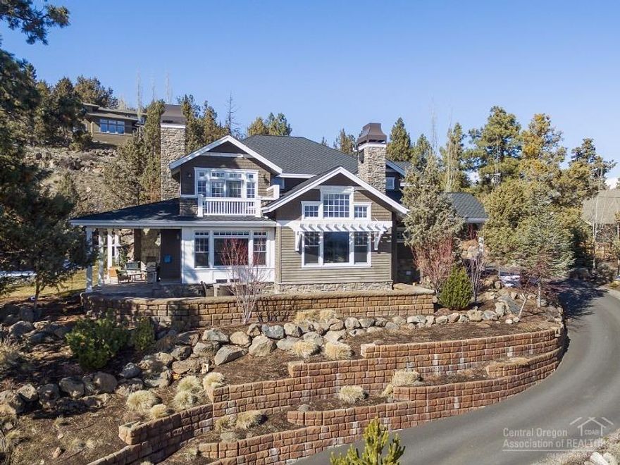 Pay attention to the detail in this fabulous, light-filled home. Extensive white woodwork includes abundant wainscoting, vaulted master tongue & groove ceiling, gorgeous cabinetry & built-ins. The kitchen boasts a Wolf range/oven, Subzero fridge & white marble island. Guest suite & office on main; huge master retreat w/ private deck upstairs plus 2 bedrooms & bonus. Addl. bonus room next to kitchen, fabulous wine cellar & tasting room, 3+ car garage, & more. Enjoy the sunrise & fireworks over Pilot Butte!