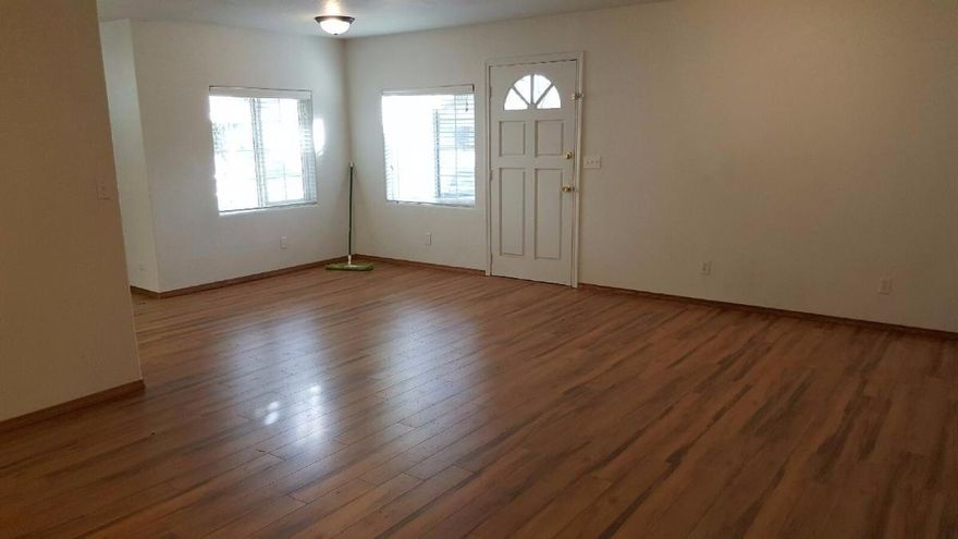 Cute Little Home with Open floor plan. 3 Bedrooms, 2 Baths, and inside Laundry room. Wonderful Workshop in Garage with Custom made work benches and cabinets. Built in 1995 but recently remodeled with sparkling New Laminate flooring, Vinyl window, and roof 6 years new. Lovely picket fenced yard boast Wisteria draped Archway. Great Investment $172,900.