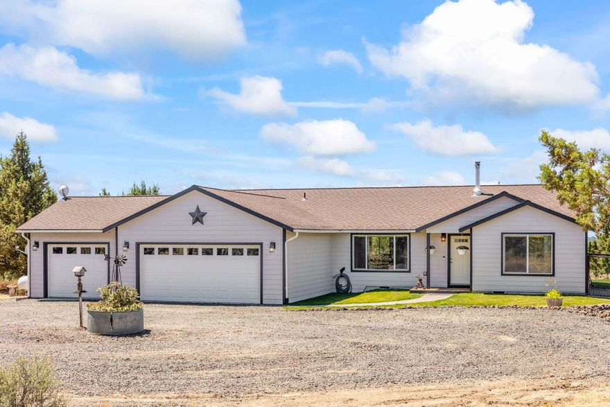 Enjoy peace, privacy, and wide-open skies from this 2017-built home on 10 acres with incredible Cascade Mountain views. This 1,720 sq ft home offers 3 bedrooms, 2
bathrooms, and vaulted ceilings that create a warm, open feel. You'll love the hand-scraped juniper cabinets, quartz countertops, durable tile flooring, and the walk-in tile
shower in the primary suite. Step outside to a 34' round deck—perfect for soaking in sunsets and quiet mornings. The land is landscaped and ready to enjoy. A large 24x40
shop with 200 amp service is ideal for projects, storage, or toys, and there's an RV dump for added convenience. Whether you're looking for a peaceful homestead,
weekend getaway, or a place to spread out and enjoy the view—this one checks all the boxes!