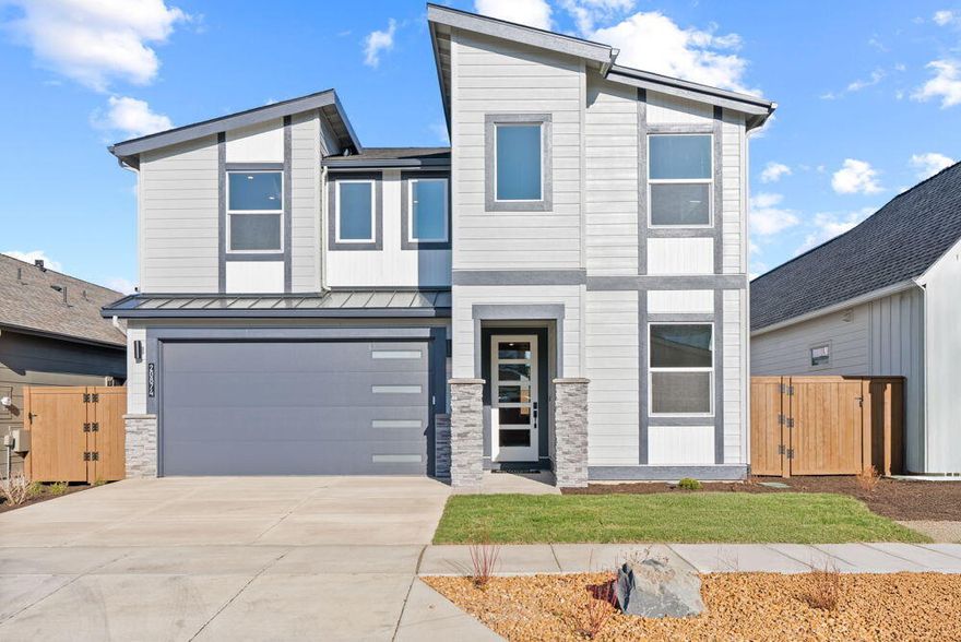 Easton Phase 2 - homesite #179 - MOVE IN READY! - This stunning upgraded Morgan on Lot 179 is completed!  This spacious 2,837 sq. ft. home offers modern living featuring an open-concept layout, main-level home office, and a spacious upstairs flex room with mountain views. Enjoy upgrades like 8' main-level doors, clear frameless glass shower door in the primary suite, fireplace cabinets, upper laundry cabinets, wood shelving throughout, and a upgraded KitchenAid 5-piece appliance set. Features include quartz counters, luxury vinyl plank flooring, vaulted great room, home office, soft-close cabinets, A/C, tankless water heater, fencing, backyard landscaping, bonus garage storage and much more. Located in SE Bend's Easton community offering access to pools, parks, and walkable streets. Photos of actual home virtually staged.  Blinds and refrigerator recently added as well.