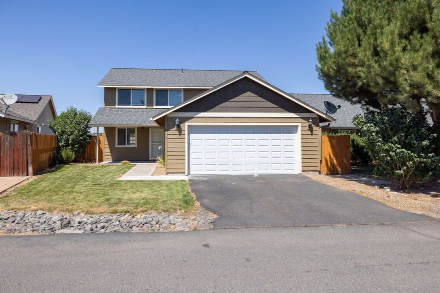 Charming Two-Story Home in The Pines Subdivision - Madras, OR This spacious 2,016 sq ft home offers 4 bedrooms and 2.5 bathrooms, thoughtfully designed for comfortable living. The primary suite is conveniently located on the main floor, while the remaining three bedrooms are upstairs, providing privacy and space for the whole family. Located in the desirable The Pines Subdivision in Madras, this home is close to public schools, shopping, and downtown amenities. Additional features include: Front yard with underground sprinkler system. Low-maintenance xeriscaped backyard A beautiful gazebo perfect for outdoor relaxation and entertaining Don't miss the opportunity to make this well-maintained home your own!