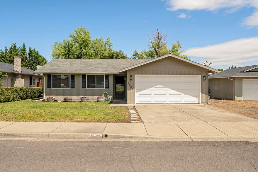 Nestled in a desirable nice area of East Medford, this charming single-story home, built in 1981, perfectly blends classic comfort and modern updates. With three bedrooms and two bathrooms across 1,152 sq ft, it's ideal for families, retirees, or anyone seeking a nice private circle. Enjoy fresh interior paint and new hardwood laminate floors in the main living areas, and new carpet in bedrooms.  The spacious living room is perfect for relaxation or entertaining. The kitchen includes essential appliances: fridge, microwave, dishwasher, oven, and range, making meal preparation a breeze. 
The 0.18-acre lot boasts a large backyard with mature trees and landscaping. Enjoy gardening or recreation along with covered patio. Don't miss the side parking for small RV or Boat on the side of the single story home.
