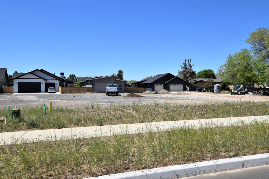 Lot 246 is located in Redmond's desirable Canyon Rim Village. Level lot sidewalks in place and alley access for parking. All building plans must be approved by ARC prior to being submitted. Here is your chance to build your dream home! Close to Canyon Rim Park, Dry Canyon Trail and Downtown Redmond. Please note that taxes have not yet been asset. Contact listing agent for more details! Neighboring lot 245 is also for sale.