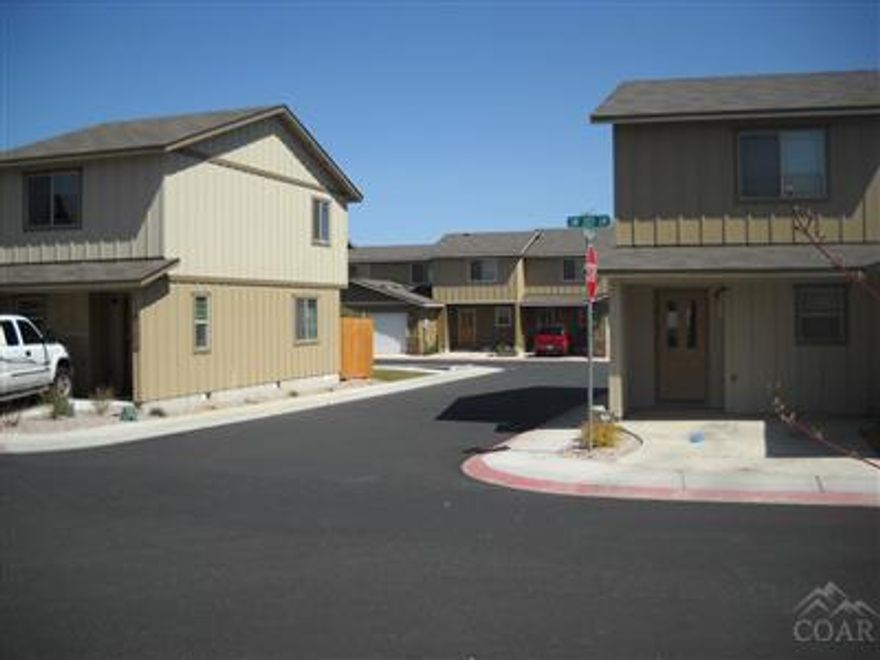 This prime 29 unit multi-family development offers a perfect blend of high quality newer construction, great location w/easy access to shopping, schools, downtown, restaurants & Hwy 97. Current rents $950 to $1,125. All units have tentative approval for Townhome conversion. Individual units feature single car garage, slate fireplace, utility rooms (some include washer & dryer), partial walk-in closets in master, and a 6x6 exterior storage area for each unit.