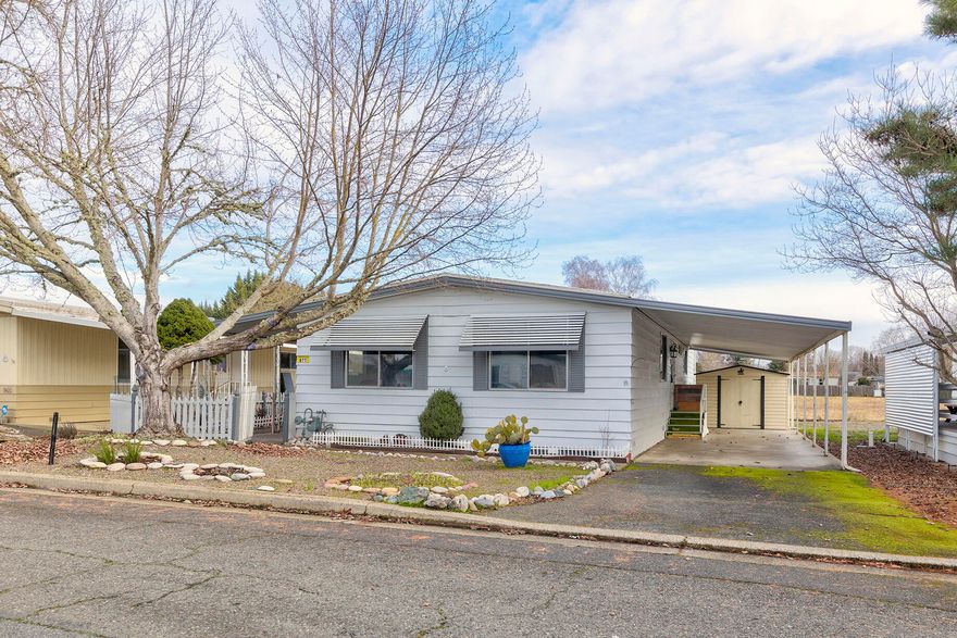 OPEN HOUSE 11-1PM, THIS SATURDAY 2/18! Move-in ready at a great price! Two bedroom, two full bath spacious manufactured home in Roguelea Estates Mobile Home Park.  Plenty of space with an open floor plan and large primary bed-bathroom.  Covered carport and 8x10 storage shed. All potential buyers must be approved by park management. The park does allow pets upon approval. One year America's Preferred Home Warranty provided by seller! Come see this home today!