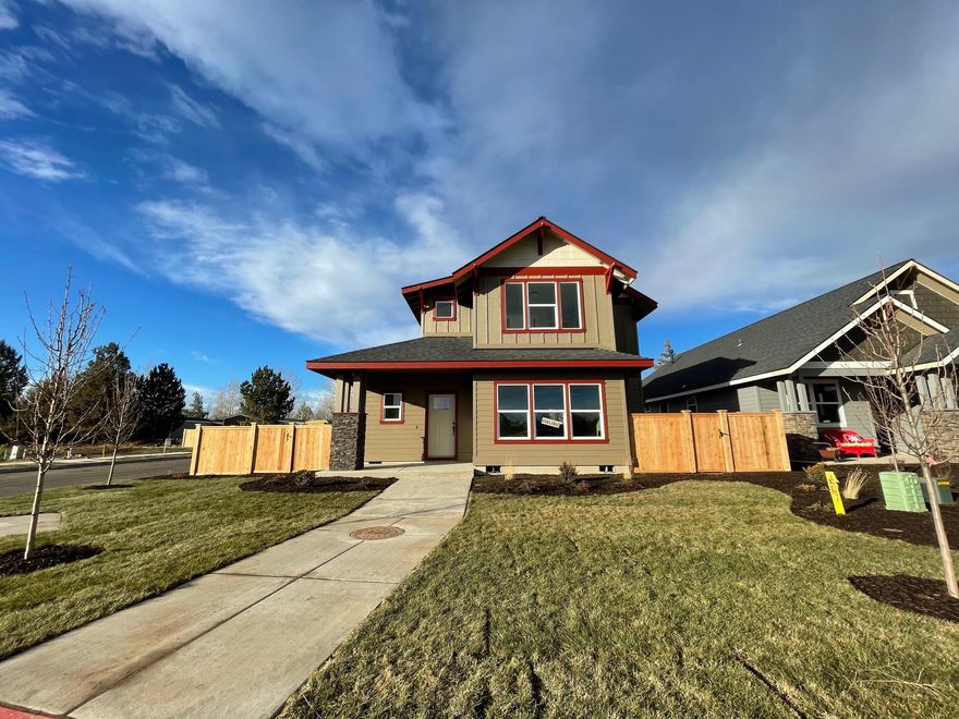 Completed SOON! Situated in NW Redmond just off the Dry Canyon, this home offers the craftsmanship & thoughtful design found in every Dunlap Fine Homes build. This expansive home ftrs spacious living spaces & over sized bedrooms & baths. Great Room layout w/attractive, open Kitchen featuring a central island that is every chef's dream! Plenty of prep space & storage, Quartz slab counters & full height backsplash. SS farm sink, gas range & dishwasher, pantry w/space for all your extras. Living space offers a cozy Gas burning fireplace w/stylish accents & room for gathering. Desirable Primary bedroom on lower level, walk in closet, step in shower & dual vanities. 2 additional guest rooms upstairs. Laundry room is on the main level off the kitchen. Durable wood look laminate flooring, carpet in the bedrooms & luxury vinyl plank in baths. Gas forced air, pre-wired for A/C, fully fenced & landscaped! Interior photos are completed of this home! Don't miss! Ready for the Holidays!