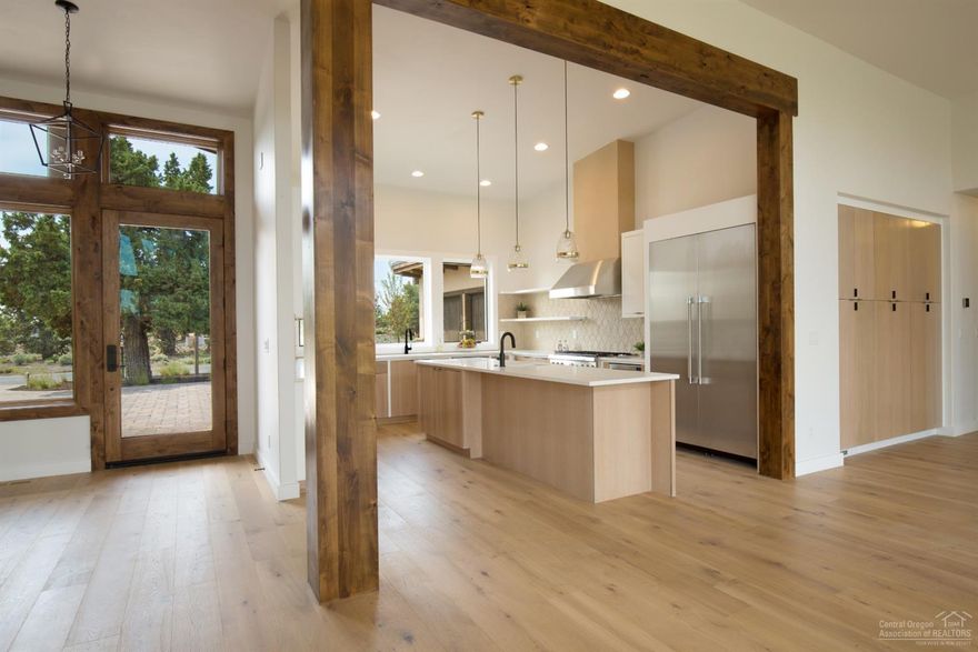 This New Single Level Contemporary home is light, bright & open plan with modern accents. Three Suites,4th Bedroom/office.Wide plank Hardwood floors, full height contemporary Fireplace,custom cabinetry & Doors. Spacious covered patio with large Firepit for gathering. Located behind the 2nd private gate in The Estates at Pronghorn. Spacious property,on .82 acre lot, backing to BLM land with unlimited recreation out your door. Very private/quiet setting.Enjoy all the amenities of Pronghorn: Private Club, 2 Golf Courses, Tennis, Pools, Restaurants, Spa, Fitness Ctr,Dog Park & more!Seller to include a Full Pronghorn Premier Club Membership at close of escrow.