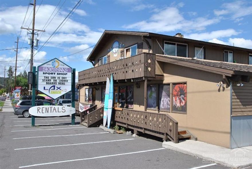 Prime owner/user opportunity in SW Bend with excellent visibility right off Century Drive. This 6,240 +/- SF building consists of one retail suite on the main floor and two apartments on the second floor. Excellent redevelopment opportunity with monthly cash flow.
