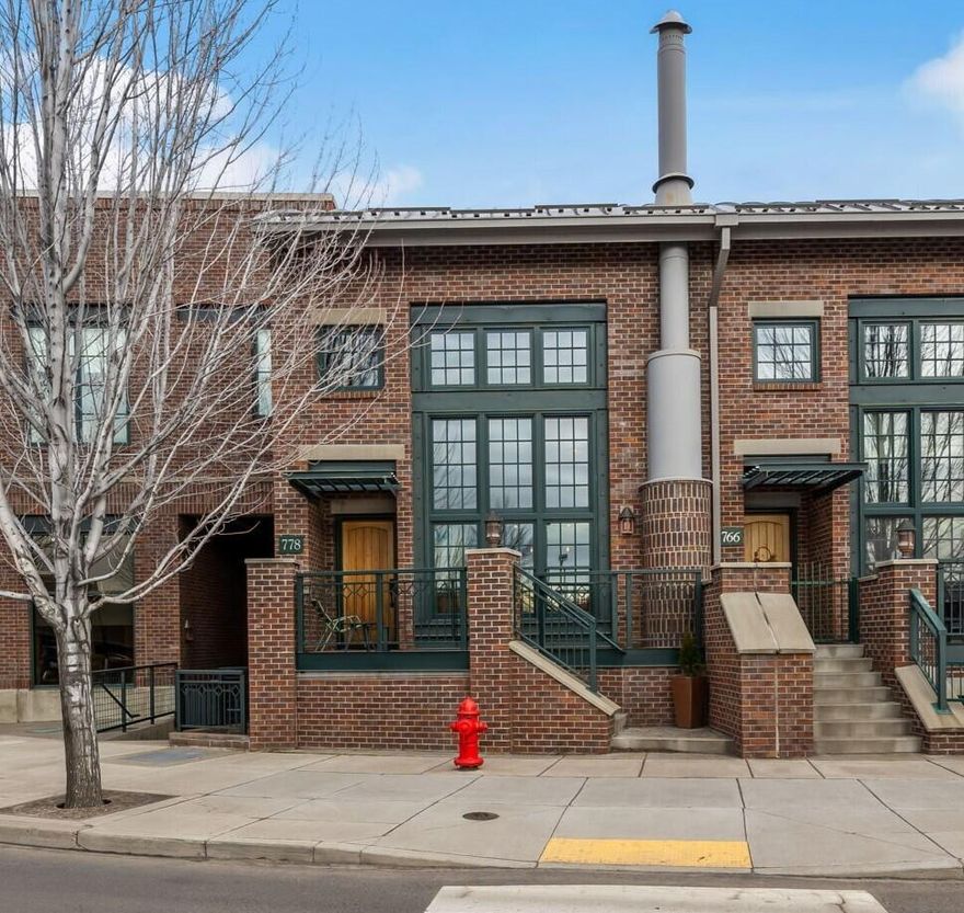Rare opportunity to own a unique Mill Quarter Brownstone in the heart of the Old Mill District. Ideal location for urban living just around the corner from the Deschutes River Trail, parks, restaurants, shops, breweries, concerts and downtown Bend. This beautifully updated home has a fun industrial aesthetic with soaring ceilings, exposed beams & ductwork. The great room with gas fireplace is a welcoming space with a grand 2-story window that bathes the home in an abundance of natural light, Gourmet kitchen w/new built-in Dacor refrigerator, Viking 6 burner range, oven & warming drawer and a dumb waiter for added convenience. 3 bedroom ensuites, one on each level for great privacy. Extensive remodel includes new flooring & paint, bathrooms, beautifully resurfaced custom cabinetry, quartz countertops, and a custom built-in window seat just to name a few.  You won't want to miss this one!