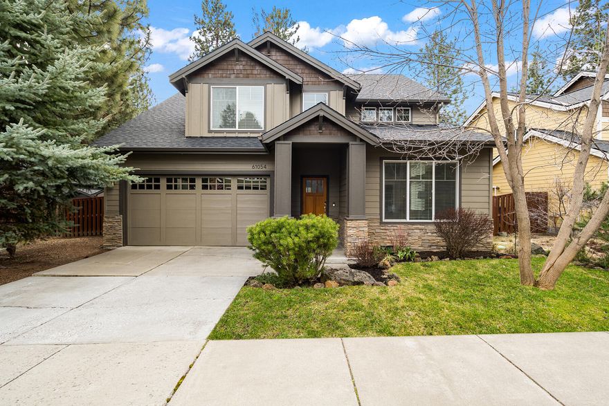 Come experience all that Bend has to offer from this impeccably maintained home in the sought after River Canyon Estates neighborhood. This move-in ready home lives like new with recently refinished hardwood floors throughout the main level, new fixtures, new roof and fresh paint inside and out. Towering ceilings welcome you into a versatile layout anchored by a well appointed gourmet kitchen with professional appliances, walk-in pantry and dry bar, while multiple living spaces provide comfort and flexibility. Upstairs, four bedrooms and a loft offer plenty of room for work, play or relaxation. The 3-car tandem garage offers space for your adventure gear, while the fully fenced backyard with covered patio and mature landscaping provides a private retreat. Steps to Hollygrape Park, blocks to the river trail or the community pool, fitness center and clubhouse, and easy access to Brookswood Plaza or the Old Mill for shopping and dining, this is a perfect base camp for Bend living!