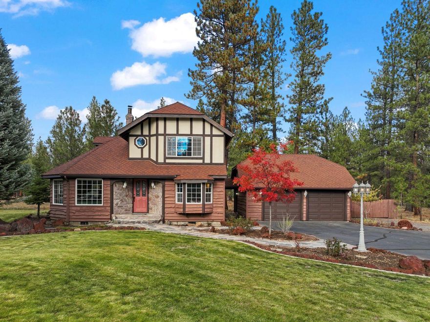 The Pinewood Cottage - Charming custom 3-bedroom, 2-bath Tudor-style home on a ½-acre lot bordering the Deschutes National Forest in Tollgate. This energy-efficient home offers year-round comfort—warm and inviting in winter, cool in summer. A beautiful central brick fireplace anchors the living space, adding character and a cozy focal point. The finished attic provides a versatile extra room perfect for an office, den, or reading room. Classic Tudor architecture, rich wood finishes, and thoughtful craftsmanship create a welcoming retreat surrounded by nature. Enjoy a spacious back deck for relaxing or entertaining, plus a detached two-car garage and separate storage shed. Tollgate amenities include a pool, tennis and pickleball courts, and miles of trails just outside your door. A perfect blend of charm, quality, and forest tranquility.