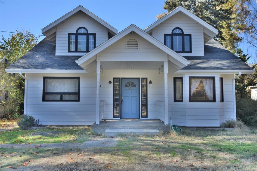 Experience the charm of this beautiful East Medford home built in 1910! On the main level you'll find a nice sized living room and kitchen with a separate dining room and laundry room. There is also a den/bonus room off the living room (could be used as a fourth bedroom!) Upstairs there are 3 bedrooms, including the master with it's own separate nook. New paint and carpet upstairs, and newly installed flooring downstairs. Large backyard, detached shop, two story shed(or playhouse!) and fresh exterior paint and outside light fixtures. Schedule your showing today!