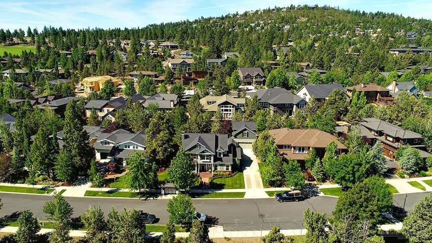 This magnificent colonial craftsman is a timeless beauty, perched on the north side of Awbrey Butte in the idyllic Awbrey Park neighborhood. The more notable features include a main level master bedroom with a Japanese soaking tub, a formal living room connected to a stately dining room, a fully permitted apartment above the garage, and an incredibly private and inviting backyard with retractable shades on the pergola. Across the street is Sawyer Uplands park with an entrance to the Deschutes river trail just below. This home has been lovingly cared for and the quality is apparent both inside and out!!