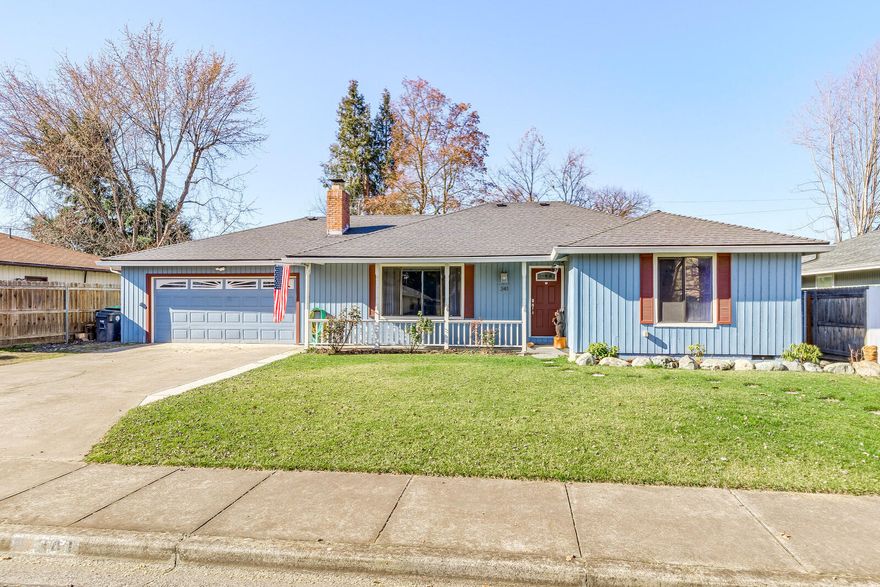 Super sweet home located in a great neighborhood in Central Point. This home features an open floor plan concept, 3 bedrooms, 2 bathrooms, 1280 sq ft, beautiful newer laminate flooring in entryway/living room/kitchen/hallway, newer interior and exterior paint, tankless hot water with new gas line installed about 2 years ago and a lot of natural lighting throughout.  Spectacular kitchen offers a 5 burner gas range/oven, microwave, refrigerator, breakfast bar and amazing pantry cabinets that have a pull-out. Wonderful living room with large window, ceiling fan and fireplace (not been used by the owners). Master bedroom with attached remodeled master bathroom. All bedrooms have ceiling fans. Hall bathroom has tub/shower combo. New front yard landscaping with full sprinkler system. Enjoy the huge back yard with a covered patio, mature landscaping, fencing and two gates. Attached 2 car garage with workbench, shelving and loft area for storage. This home is move-in ready.