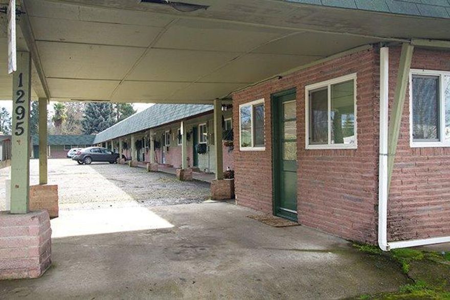 Attention Investors! 13 unit apartment complex that has great income history. Affordable rentals always stay rented. .74 of an acre Zoned commercial so possible to add commercial units. Units consist of 2- 2 bedrooms, 8- 1 bedrooms, 3 studios, coin operated laundry, new Duralast rubber roof in 2012-13 and some updating in the units. Owner financing is available. Call listing agent for appointment and information.