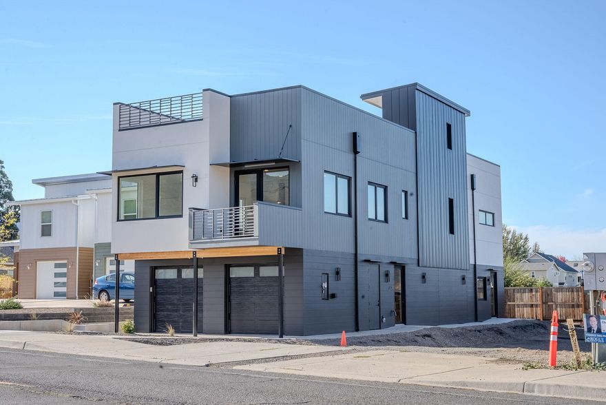 You'll absolutely love this new home in Talent, just minutes from Ashland. Designed & built to exceed energy standards w/ high-end modern living- welcome to the Romeo Project. This property offers a main single-family home with an attached ADU that would easily bring in fantastic income as a rental or the perfect design for a mother-in-law unit. Experience roof top living engineered for a hot tub, garden beds & fantastic views. This home will reach Earth Advantage Platinum status with high-performance doors & windows, an airtight healthy ventilation system, fire-resistant exterior materials, above code insulation, energy efficient HVAC & hot water systems along w setup ready for solar & EVs. Experience comfort year-round w very low utility costs & relish in the modern design boasting a level of urban sophistication that you'll truly appreciate in this one-of-a-kind home. An incredible home to live in & a very solid investment! Lot next door also available for sale as a package deal.