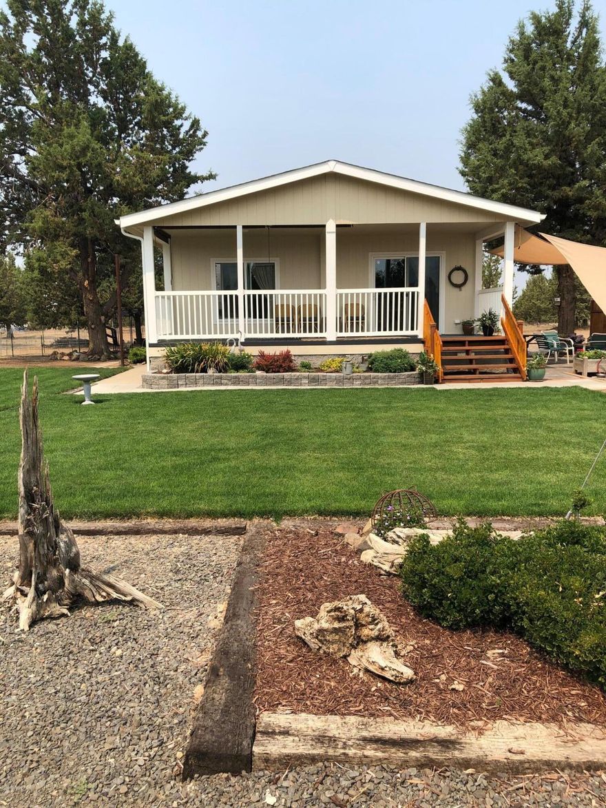 You will be amazed at how well the owners have kept  this property. It is beyond neat and clean.  This property shows pride of ownership.  Bend Broadband 5G internet. It is turn key and you can just move right in.  1344 sq ft  Energy efficient home with two bedrooms and a den and 2 full baths all on 2.68  flat acres.  All kitchen appliances included. 8 ft ceilings in this home make it feel spacious. Dog kennel. 10 x 15 shop.  10 x 20 small storage shed/office.  Quiet location and great neighbors. Beautiful paver patio and outdoor shower that is incredible...  RV hook up w/ 30 amp. This home is absolutely incredible. Call for your private showing now.
