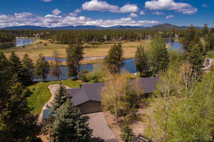 Astounding quality greets you as you approach this custom single level home on 3 plus irrigated acres with pristine Deschutes River frontage, unobstructed views of Mt. Bachelor & unspoiled wilderness. Come unwind on one of the best docks on the river. Home was thoughtfully designed to maximize the view from nearly every room. Two master suites, private drive, greenhouse & separate shop.